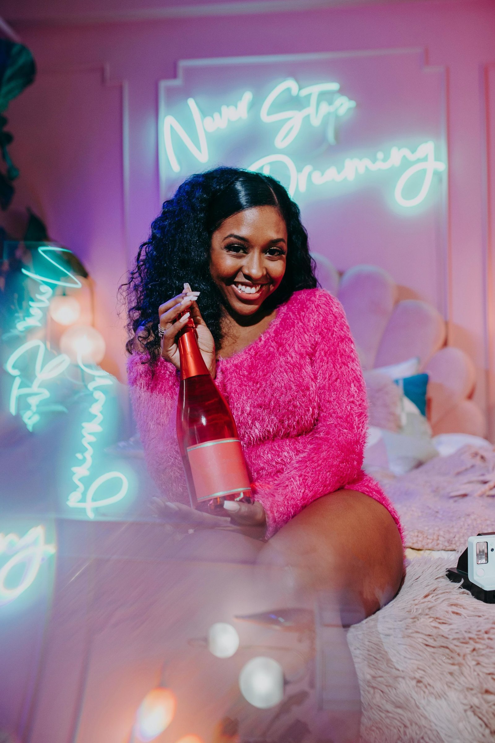 xmas party goer with a bottle of champagne